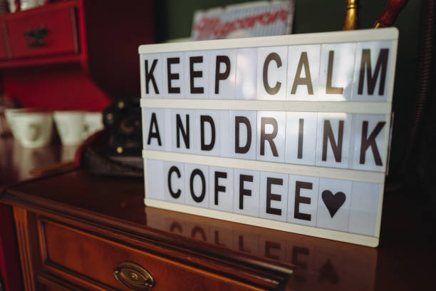 istock Keep Calm and Drink Coffee sign in coffee shop 1333007246
