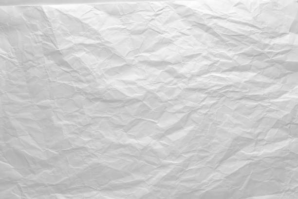 istock Texture of crumpled white paper , abstract background 1333011235