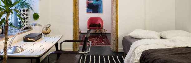 istock Eclectic bedroom with desk, panorama 1333017160