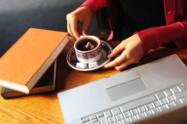 istock University Student Studying in Parisian Sidewalk Internet Cafe 133302274
