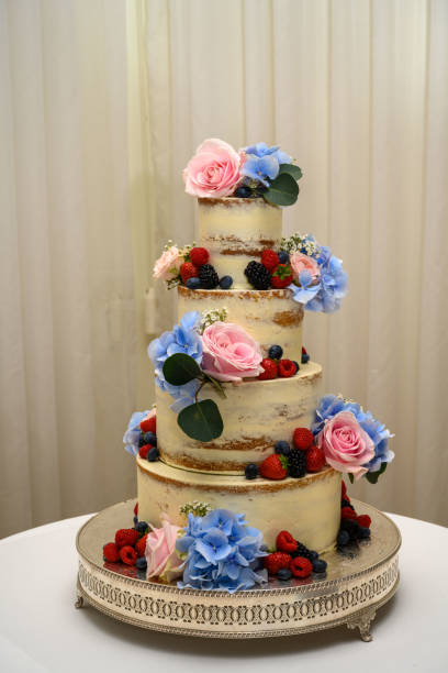 istock Wedding cake decorated with fresh flowers and berries 1333023219