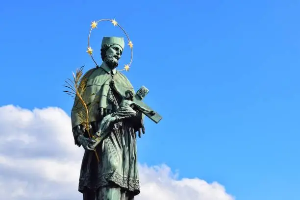 The statue of St. John of Nepomuk is an outdoor sculpture, installed in 1683 on the north side of the Charles Bridge in Prague, Czech Republic.