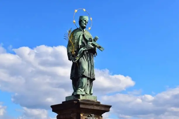 The statue of St. John of Nepomuk is an outdoor sculpture, installed in 1683 on the north side of the Charles Bridge in Prague, Czech Republic.