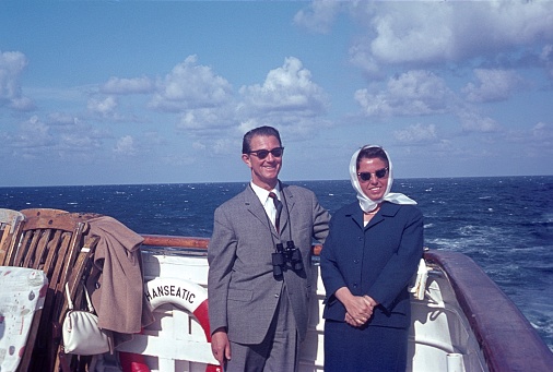 North Sea, Nordlandfahrt (Norwegian coast), 1965. Married couple on the deck of the cruise ship Hanseatic.