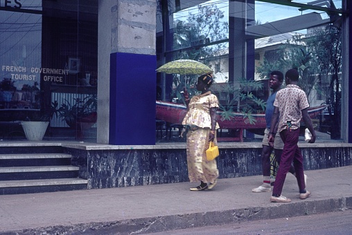 Monrovia, Liberia, Africa, 1968. Street scene with passers-by in the West African city of Monrovia.