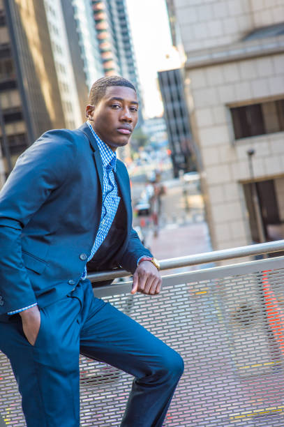 istock Young black man standing outdoors in New York City, relaxing 1333035251