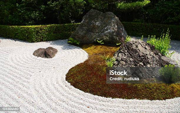 Stones And Raked Gravel In A Zen Garden Stock Photo - Download Image Now - Japanese Rock Garden, Sand, Rake