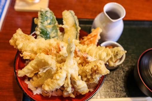 Tendon which is Tempura donburi in Japan 天丼.  Shrimp and Vegetables Tempura donburi.