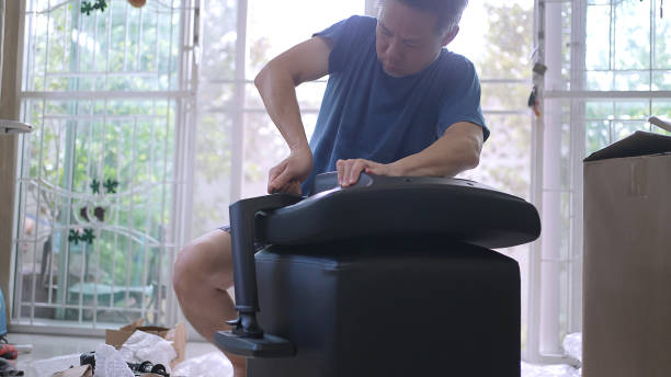 istock Man build the chair. DIY 1333049320