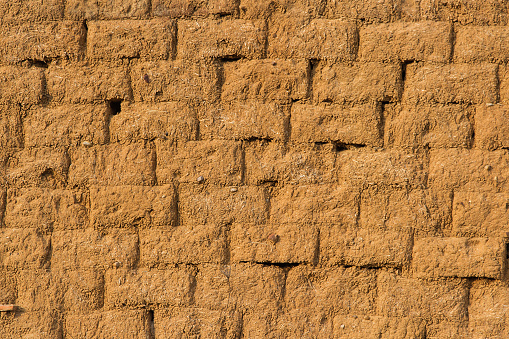 Wall for background or texture. Blocks of adobe, mud and straw cooked in the sun - Pared para fondo o textura. Bloques de adobe, barro y paja  cocido al sol