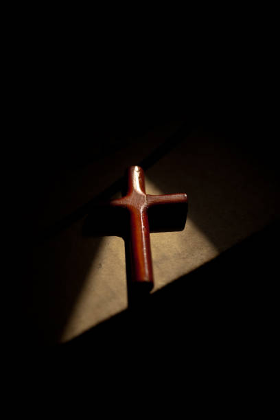 istock Light, shadow, cross of wood. 1333054744