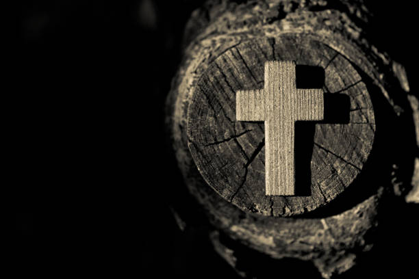 Light, shadow, cross of wood.