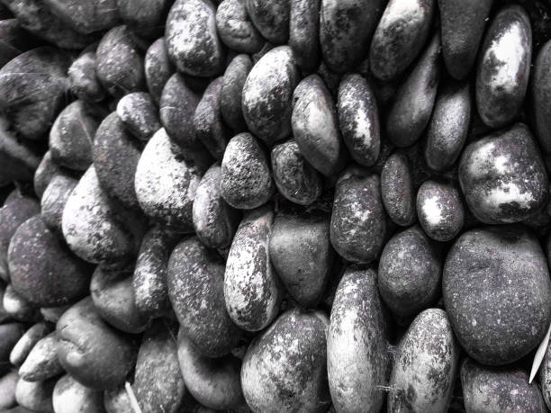 istock Natural dark abstract background texture stones 1333061129