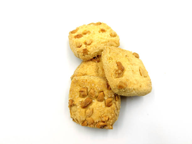 istock Home made sweet biscuits with mixed nuts on white background 1333062301