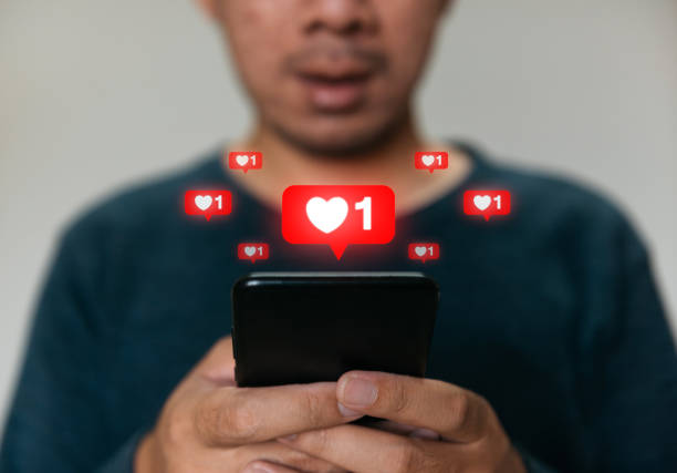 istock Close up hands holding smartphone. man using cellphone for marketing  and searching data and social media on internet. technology business investment concept 1333064132