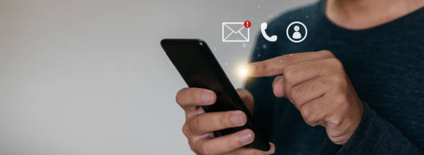 istock Close up hands holding smartphone. man using cellphone for marketing  and searching data and social media on internet. technology business investment concept 1333064138