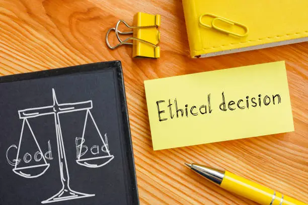 Photo of Ethical decision is shown on the conceptual photo using the text