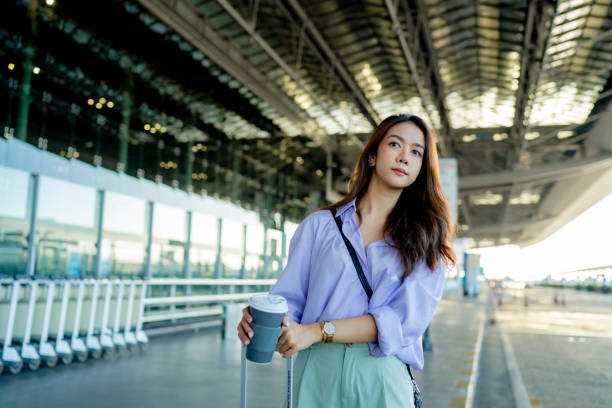 istock Beautiful woman looking for a bus 1333066601