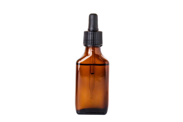 istock Brown bottle with drip dispenser isolated on white background. 1333067401