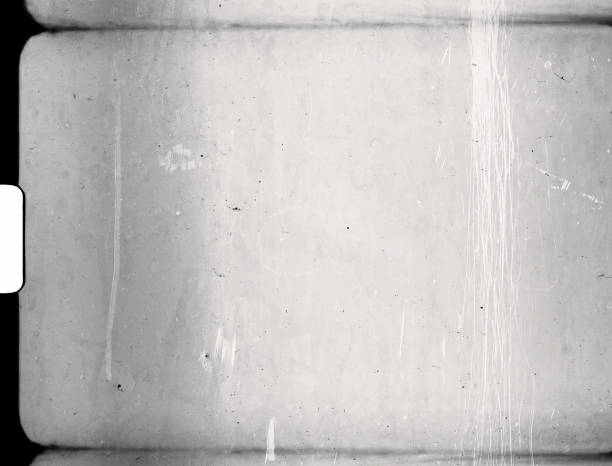 empty or blank 8mm film frame with black border and dust. super 8 film scan. film industry stock pictures, royalty-free photos & images