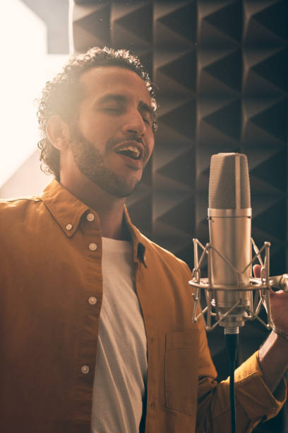 istock Moroccan man recording vocals in studio 1333069242
