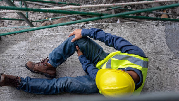 istock Knee accident at work of construction worker at site. Builder accident falls scaffolding on floor 1333069421