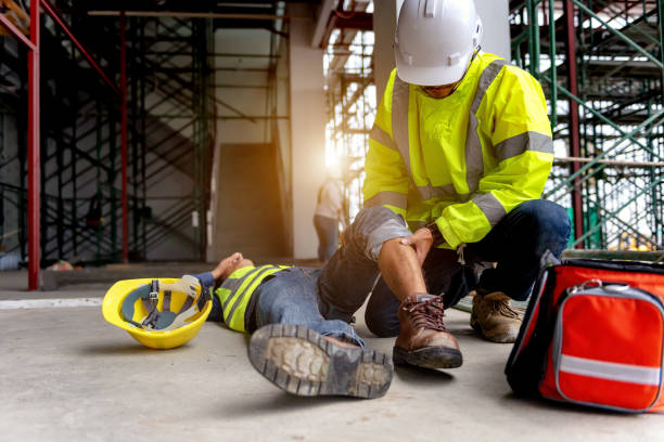 istock First aid support accident at work of construction worker at site. Builder accident falls scaffolding on floor 1333069431