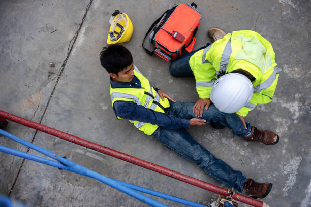 istock First aid support accident at work of construction worker at site. Builder accident falls scaffolding on floor 1333069451