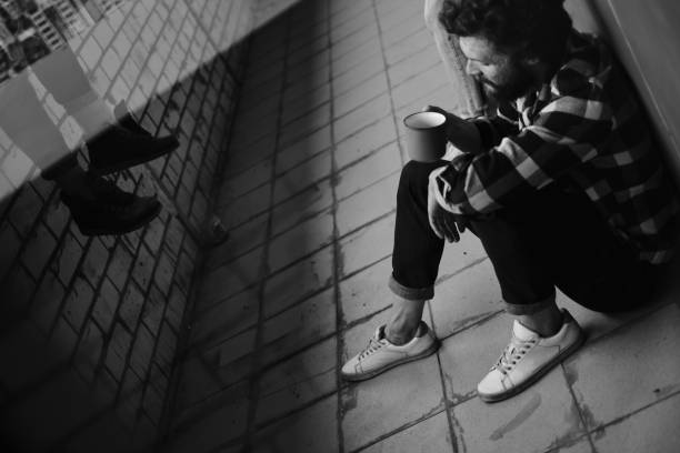 istock Man drinking tea on the balcony floor 1333070009