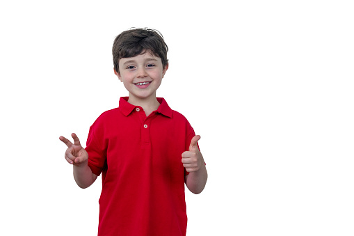 Boy wearing red polo shirt, white background and space for text