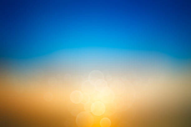 istock Abstract sea background. Abstract tropical sandy summer beach background with bokeh lights on light blue sky and sun. Beautiful texture. Space. 1333075530