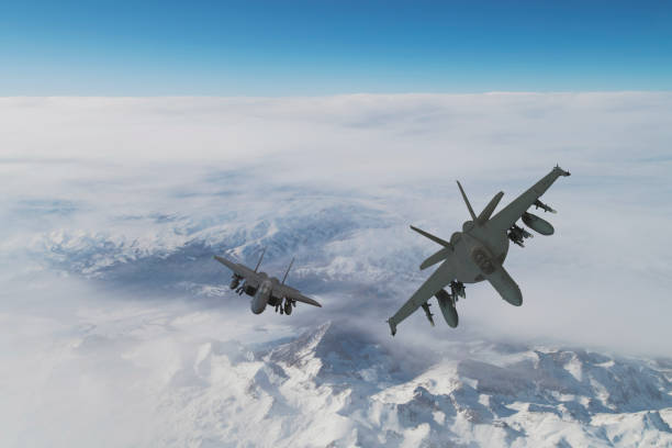 istock Jet fighters flying over the clouds. 1333082680