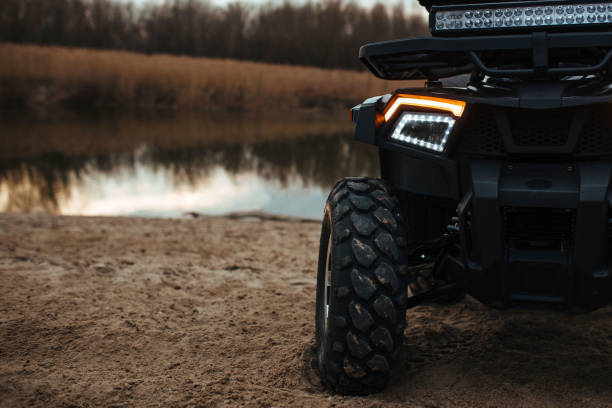 istock headlights in the background a river and sand 1333085950