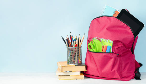 istock school backpack, books and pencil holder 1333087284