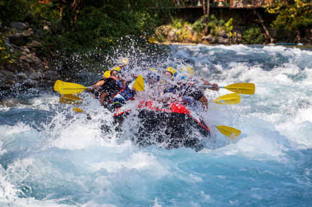 istock Group of people white water rafting 1333088147