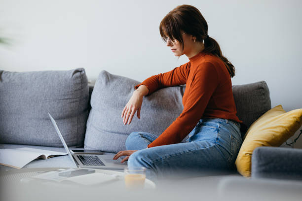 istock Beautiful Business Woman Using Laptop Computer at Home 1333092719
