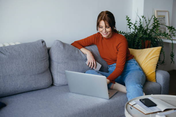 istock Beautiful Business Woman Using Laptop Computer at Home 1333092723