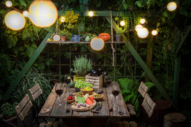 istock Evening dinner with wine and appetizers Evening garden meeting. 1333092996
