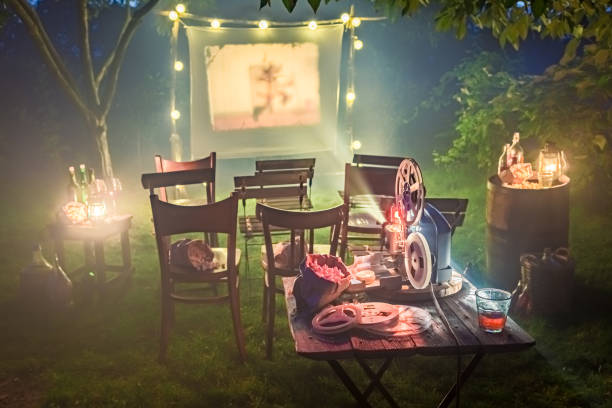 istock Open air summer cinema with vintage projector in the evening 1333093695