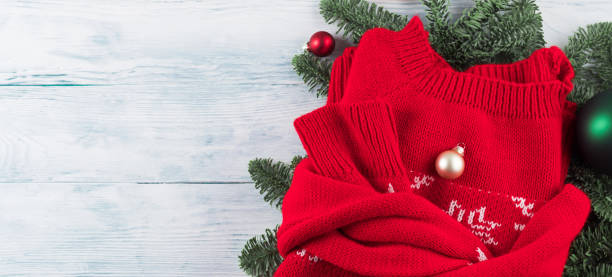 Red ugly christmas sweater with green ornament