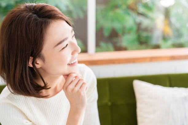 istock attractive asian woman relaxing 1333104573