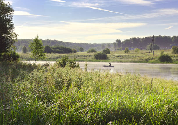 Fisherman on a boat on the lake