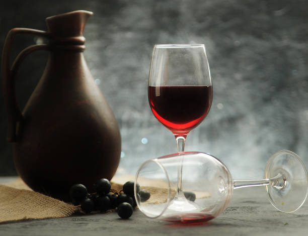 istock georgian jug and wine glasses  on linen 1333111826
