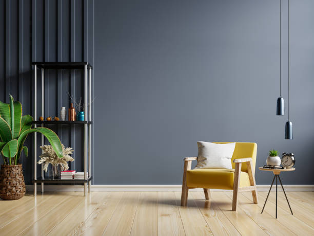 istock The interior has a yellow armchair on empty dark wall background. 1333111951