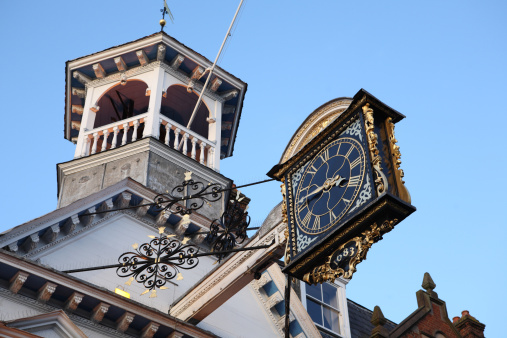 The 17th Century Guildhall with town clock in Guildford High Street, Surrey, UK.