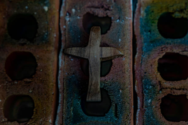 istock Brick and wooden cross 1333117189