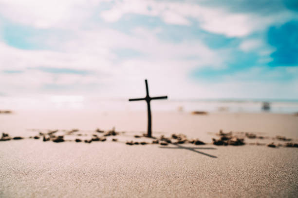 istock Jesus the Savior and Wooden Cross 1333117869