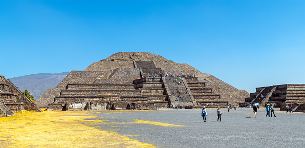 Moon pyramid with people (tourists) walking, Teotihuacan, Mexico.