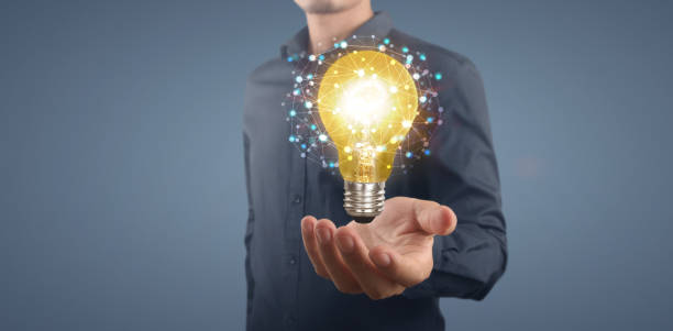 istock Hand of holding illuminated light bulb,  innovation inspiration concept 1333120714