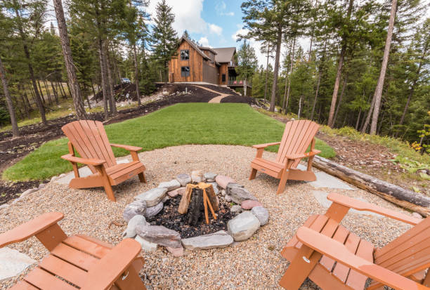 istock Circular fire pit area in back of home in the forest 1333124208